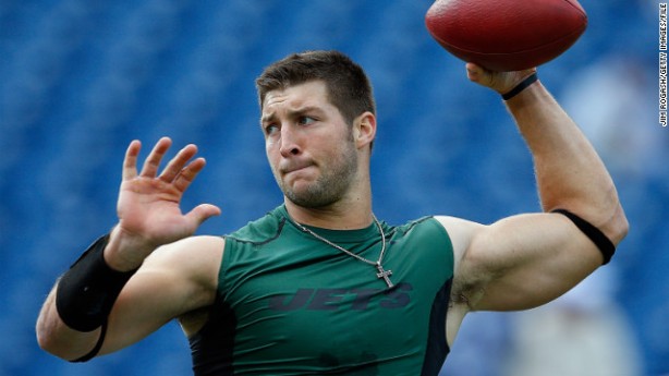 130219093837-tebow-passes-story-top